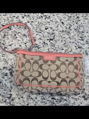 Coach Signature Canvas Wristlet in Coral Trim
